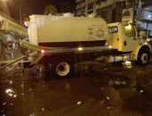 40 سيارة كسح بشوارع أسيوط لشفط مياه الأمطار 