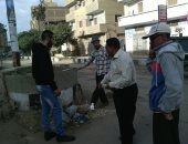 بالصور ..حملة نظافة بشوارع وميادين مدينة بيلا