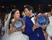 حسن الرداد ينشر صورة له مع زوجته إيمى سمير غانم.. ويعلق على حفل زفافه