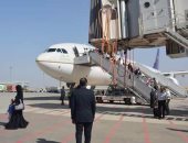 بالصور..مطار القاهرة يجرى تجربة دخول طائرة لمهبط مبنى 2 الجديد