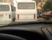 سيارات نقل المواطنين بلا لوحات معدنية فى شوارع الجيزة