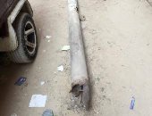 بالصور.. عمود إنارة يهدد أهالى منطقة البساتين بخطر الصعق بالكهرباء