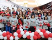 بالصور.. نجوم الأهلى يوزعون التيشرتات على ذوى الاحتياجات الخاصة