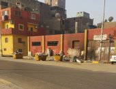 قارئ يطالب بنقل صناديق قمامة من شارع البحر الأعظم بالجيزة