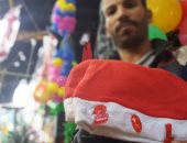 رغم ارتفاع أسعارها.. بالصور.. هدايا "الكريسماس" تملأ شوارع أسيوط