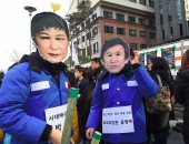 كاهن بوذى فى كوريا الجنوبية يحاول الانتحار حرقا خلال تظاهرة احتجاج ضد الرئيسة