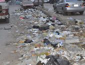 بالصور...شبرا الخيمة تستقبل العام الجديد بتراكم القمامة بالشوارع الرئيسية