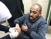 أقارب مستشار الرشوة المنتحر يعتدون بالضرب على مصور "اليوم السابع"