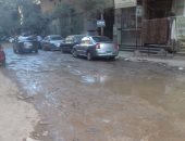 بالصور.. المياه تغرق شارع التعاون فى فيصل.. والقراء يستغيثون