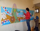 بالصور.. "رسم الجدارية على الحوائط وورش للأطفال" أبرز أنشطة مركز كوم أمبو