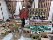 ضبط 629 زجاجة خمور مجهولة المصدر فى محل بالنزهة