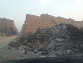 بالصور.. تلال القمامة والمخلفات تغلق شارع كعبيش فى المريوطية