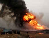 بالصور.. داعش يضرم النيران فى بئر نفط القيارة قبل فراره من الجيش العراقى