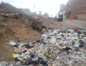 بالصور.. شكوى من انتشار القمامة أسفل الطريق الدائرى بالمرج الجديدة