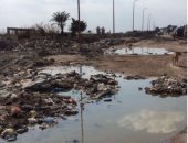 طريق "أم زغيو" بالإسكندرية غارق فى "القمامة والمياه" دون اهتمام المسئولين