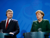 رئيس أوكرانيا يقطع زيارته لألمانيا بسبب خسائر جيشه فى مواجهة المتمردين