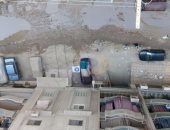 بالصور.. مياه الصرف الصحى تغرق شارع محمد حسن بكفر طهرمس