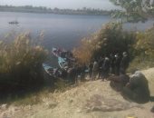 بالصور.. الحماية المدنية تواصل جهودها لانتشال جثة ربة منزل ونجلها غرقا بقنا