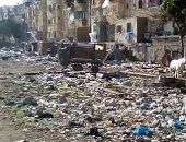 شكوى من تراكم القمامة فى شوارع غيط العنب بالإسكندرية