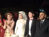 بالفيديو والصور.. شاب صينى يشهر إسلامه ليتزوج بفتاة مسلمة فى دمياط