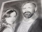 "فنان بدرجة مهندس".. مؤمن يقلب الأهرامات بيد الحضرى ويحلم بمعرض لرسوماته