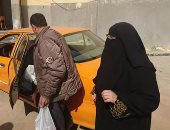 نشطاء أقباط يتدولون صورًا لمنتقبة توزع وجبات على أقباط العريش بالإسماعيلية