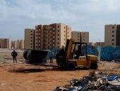 بالصور.. رفع 125 من الكابلات والأعمدة الكهربائية بالحى الإماراتى فى بورسعيد