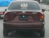 سيارة بلوحات مرورية مطموسة بطريق المحلة الكبرى  