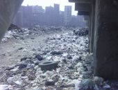 بالصور.. القمامة تحاصر أهالى مدينة الرحمن بفيصل