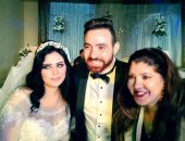 أدمن "أسف ياريس" ينشر صورة بصحبة رولا خرسا من حفل زفافه