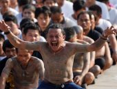 بالصور.. آلاف التايوانيين يحتفلون بمهرجان الوشم المقدس لشحن أجسادهم بالطاقة