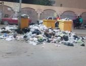 انتشار صناديق القمامة أمام مدرسة الشروق فى بولاق الدكرور