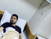 شاهد.. عبدالله بيكا لاعب المصرى فى المستشفى بعد إصابته بالتسمم