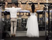 لو ده جنان إتجنن..فوتو سيشن لعروسين فى "الجيم"
