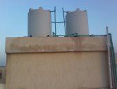 أحد قاطنى مشروع الإسكان بمدينة السلام يشكو من تسريب خزانات المياه أعلى العمارات