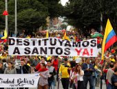 بالصور.. تظاهرات فى كولومبيا ضد الرئيس سانتوس بسبب عملية السلام مع مسلحى فارك  