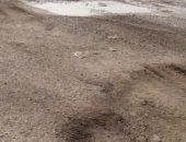 قارئ يشكو من تهالك الطريق بالتجمع الثالث فى القطامية