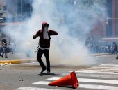 بالصور.. اشتباكات عنيفة بين الشرطة ومتظاهرين فى فنزويلا