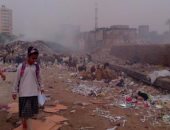 بالصور.. حرق القمامة بجوار إحدى المدارس خلف حديقة بدر فى جسر السويس