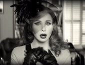 بالصور.. الستينيات تعود من فساتين "نانسى عجرم" بأحدث كليباتها