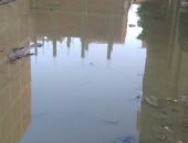 بالصور.. مياه الصرف الصحى تغرق شوارع المرج 