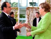 بالصور.. المستشارة الألمانية تستقبل "هولاند" فى برلين