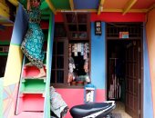 مواطنون فى جاكرتا الإندونيسية يلونون بيوتهم للتشجيع على عدم التدخين