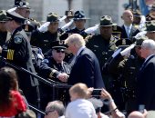 بالصور.. ترامب ونائبه يشهدان الحفل التذكارى للضباط الوطنيين فى واشنطن