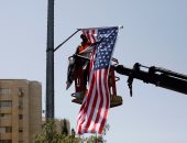 بالصور.. رفع العلم الأمريكى فى القدس استعدادا لاستقبال الرئيس دونالد ترامب