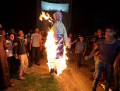 بالصور.. فلسطينيون يحرقون علمى أمريكا وإسرائيل وملصقات لترامب ونتنياهو 