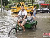 بالصور.. توقف المؤسسات الحكومية جنوبى الصين بسبب الأمطار الغزيرة
