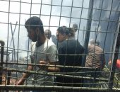 بالفيديو والصور.. الحماية المدنية بالجيزة تسيطر على حريق بسوق ملابس فى إمبابة