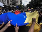بالصور.. مؤيدون للرئيس مادورو يتظاهرون ضد النائبة العامة فى فنزويلا