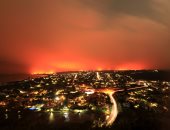 بالصور.. إجلاء آلاف السكان فى مقاطعة كنيسنا بجنوب إفريقيا بسبب حرائق الغابات